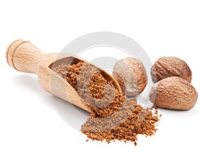 Milled nutmeg on white photo