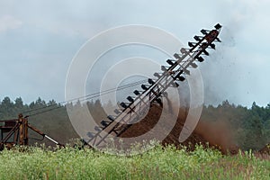 Milled peat production using steel belt conveyor photo