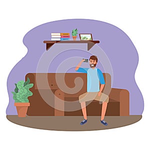 Millenial person sitting using smartphone indoors background frame