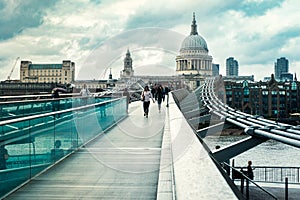 The Millenium Bridge and Saint Paul Cathedral on a typical rainy day in London