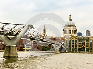 Millenium Bridge and St Paul`s Cathedral. London