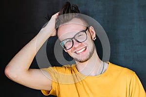 Millennial portrait happy smiling bearded hipster