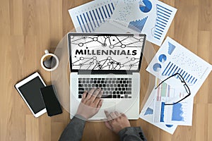 MILLENNIALS CONCEPT Business team hands at work with financial r