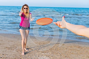 Millennials girls playing on the beach