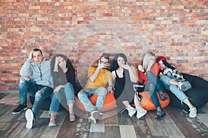 Millennials hang out relaxing lounge area bored