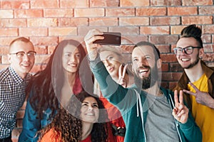 Millennials routine group coworkers team selfie