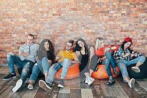 Millennials sitting resting lounge zone bored