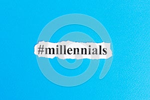 Millennials text on paper. Word Millennials on torn paper. Concept Image