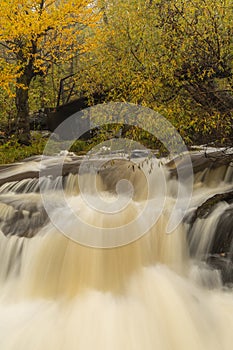 Miller Creek Waterfall & Bridge In Autumn