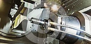 Milling cnc machine at metal work industry. Multitool precision machining.