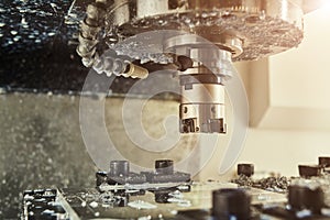 Milling cnc machine at metal work industry. Multitool precision manufacturing and machining