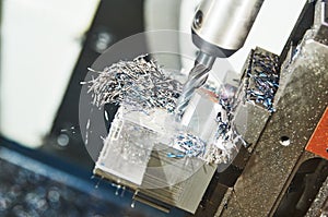 Milling cnc machine at metal work industry. Multitool precision manufacturing and machining