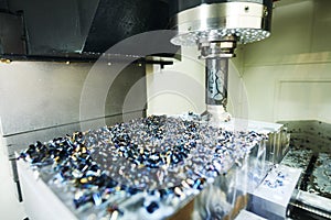 Milling cnc machine at metal work industry. Multitool precision manufacturing and machining