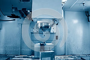 Milling cutting metalworking process. Precision industrial CNC machining of metal detail by mill