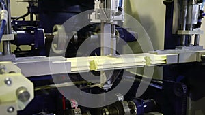 Milling of grooves in a wooden bar on the machine