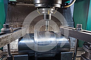 Milling keyway shaft on the CNC machine photo