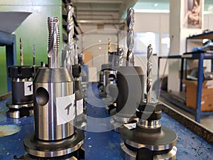 Milling machine tools in metalworking process. Industrial CNC metal machining by vertical mill.