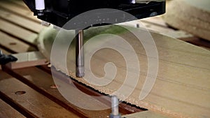 Milling machine on a tree, work of a cutter on a tree