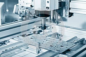 Milling machine working on steel detail.CNC milling machine working, Cutting metalwork processn photo