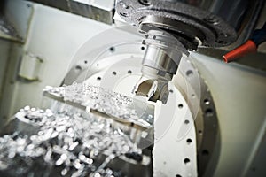 Milling metalworking. CNC metal machining by vertical mill.