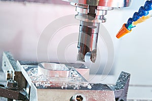 Milling metalworking. Industrial CNC metal machining by vertical mill.