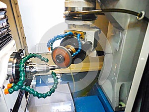 Milling metalworking process. Industrial CNC metal machining by vertical mill.