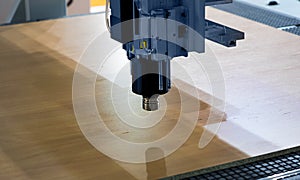 Milling a wooden board. Processing of wood panels on CNC coordinate milling woodworking machines. CNC woodworking machine