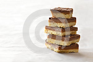 Millionaire`s shortbread with chocolate and caramel.