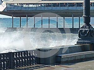 Millions of splashes of breaking waves from impacts on the granite embankment.