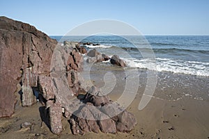 Millions of years old rocks at end of Freshwater East beach