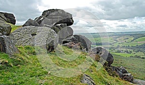 Millstone and Rock Stack on a Derbyshire Hill Side