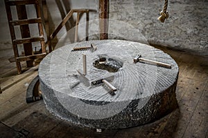 Millstone with tools