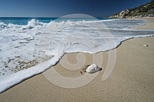 Milos beach near the Agios Nikitas village on Lefkada Ionian island, Greece. Evening sunset golden light