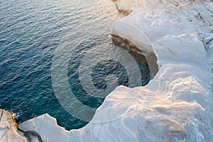 Milos island Greece aerial detail of Sarakiniko Beach in summer time