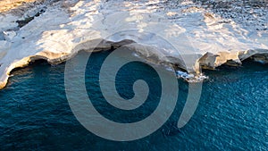 Milos island Greece aerial detail of Sarakiniko Beach in summer time