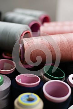 Milti-colored sewing thread and needle