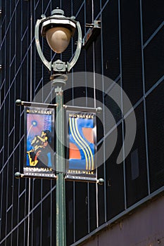 River Walk banner sign on lightpost in downtown Milwaukee, Wisconsin