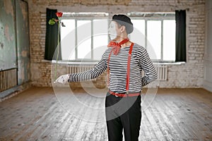 Mime artist, clown with a rose, comedy