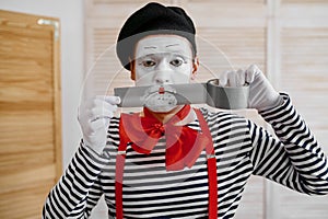 Mime artist with duct tape, parody comedy