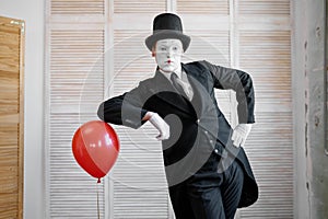 Mime artist, scene with air balloon, comedy parody