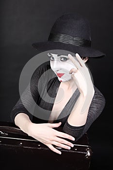 Mime artist with theatrical makeup