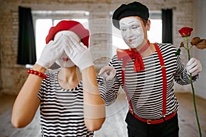 Mime artists, surprise with rose scene