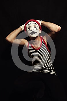 Mime on black background