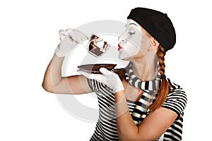 Mime comedian drinking coffee