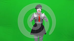 Mime girl listening to someone, agreeing, then refusing. Chroma key.