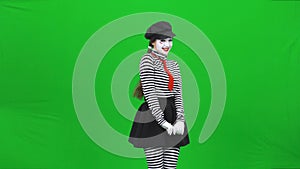 Mime girl is smiling, seducing and calling someone. Chroma key.