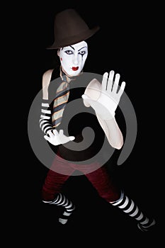 Mime in hat, tie and white gloves