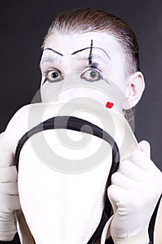 Mime holding white hat