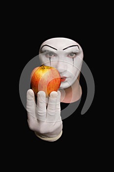 Mime with red apple