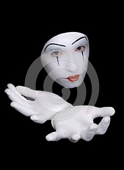 Mime in white gloves